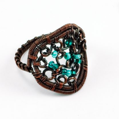 Copper ring with green glass beads
