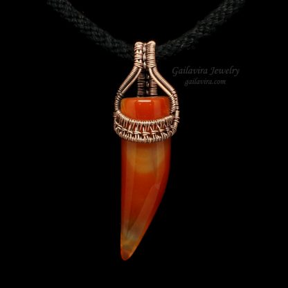 Red Agate claw wrapped in copper wire pendant
