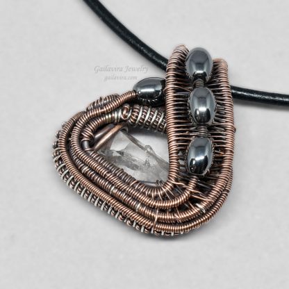 Sterling silver, copper, hematite and quartz crystal point mini heady wire wrap pendant.